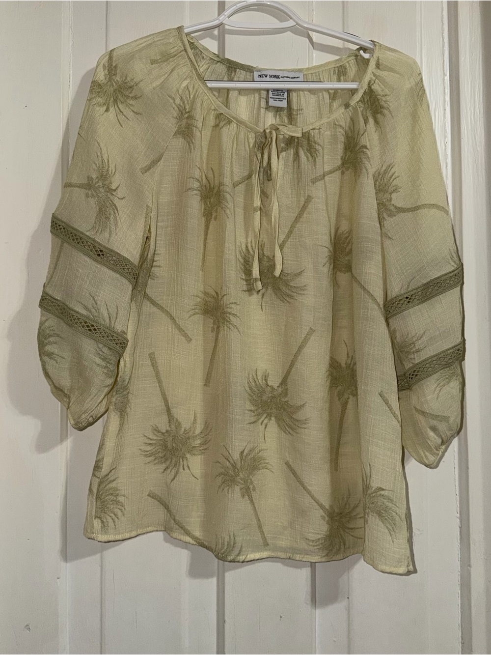 Women's size medium shirt New York & Company  Palm trees Peasant Top